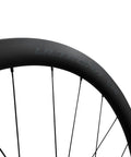 Close-up of Ultegra WH-R8170 C36 Carbon Road Wheelset Tubeless Ready For Disc Brakes 700c with 36mm deep rim and spokes.