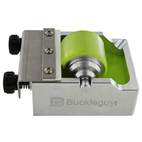 Heavy Duty Aluminum Leather Edge Paint Roller Featuring Spring Loaded Tension Knurled Handle For Tweaking Pressure And Knocking Out Killer Leather Finishes Fast, showing top view with green knurled roller.