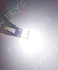 Error Free LED T10 Bulbs For Mercedes W204 C300 C350 Eyebrow And Eyelid Lights held showing bright white light