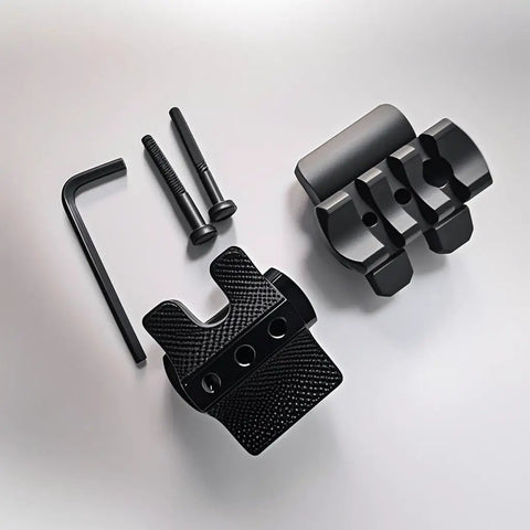 Beefy Barrel Clamp Mount With Rubber Pads For Picatinny Rail Flashlight Attachments On 12 Gauge Shotguns laid out with bolts and wrench