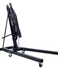 Heavy Duty 2 Ton Hydraulic Engine Hoist Folding Cherry Picker with six slick iron casters in a folded position.