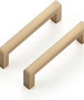 Two champagne bronze slim cabinet handles from the 10 pack solid square bar drawer pulls for kitchen cabinets, 3 inch hole center, side view.