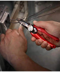 Electrician using Six-In-One Long Nose Pliers For Electricians Pro Grade Wire Stripper And Reamer Combo Seven And One Half Inch