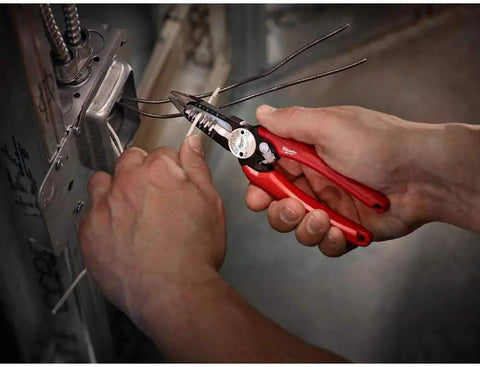 Electrician using Six-In-One Long Nose Pliers For Electricians Pro Grade Wire Stripper And Reamer Combo Seven And One Half Inch
