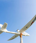 Person holding Prodigy 1400mm Wingspan RC Plane With Vector Flight Stabilization System 4 Channel Remote Control Airplane Ready To Fly