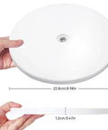 Person holding 9 Inch White Acrylic Lazy Susan Turntable With Ball Bearing Rotation Holds Up To 55 Lb Spices, Cake Stand.