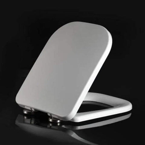 Heavy Duty Square Toilet Seat Boasting Dead Quiet Soft Close Hinges And Ridiculously Simple Quick Release Hardware Painted In Crisp White Durable Duroplast for standard bathrooms, side view.
