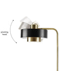 Close-up of Felipe Floor Lamp with Tilting Head, Antique Brass Finish and Matte Black Accent, Mid Century Modern Style