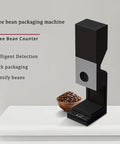 Commercial Coffee Bean Batch Dispenser And Boss Level Weighing Scale For Specialty Cafes Heavy Duty Aluminum Body on a countertop.