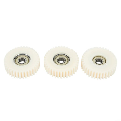 Three white nylon gears from the 36T Planetary Gear Set For Electric Bike Motors with integrated bearings, 47.5 x 13.5 mm