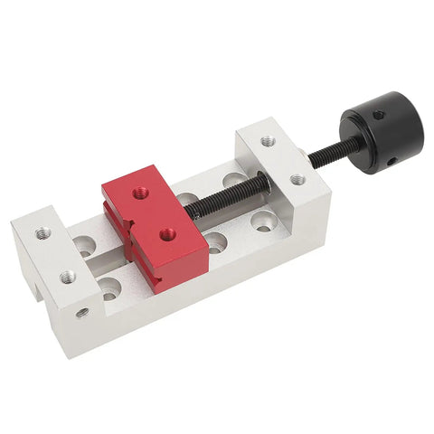 Sweet Mini Aluminum Clamp And Bench Vise Provides Adjustable Jaw Control For Drill Press And Woodworking Tasks, red and silver build, compact size.