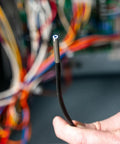 Close-up of Rugged Utility Borescope Endoscope Camera With 9.8 Ft Waterproof Gooseneck 5.5 mm Insertion Tube held by hand.
