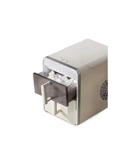 Quick Freeze Countertop Ice Maker for Home and Dorm slams out fast cubes in minutes with a slim silhouette and push buttons.
