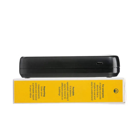 Side view of Corentium Home Radon Detector 223 Portable Battery Operated with Three AAA Batteries, shown on yellow box packaging.