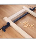 No Nonsense Heavy Duty T Bar Clamp With 48 Inch Frame And 42 Inch Jaw Width, Cold Drawn Steel Bar, Malleable Iron Head And Pin Locking Slide, Pro Shop Favorite Built Tough For Serious Woodworking And Assembly Projects in use with wooden pieces.