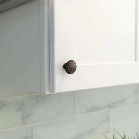 Ravenna Series Solid Traditional Kitchen Cabinet Pull Handle Knob One And One Quarter Inch Oil Rubbed Bronze 10 Packs installed on cabinet