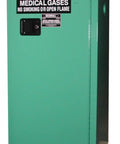 Built Tough Medical Gas Cylinder Storage Cabinet Holds D And E Cylinders Osha Compliant, green steel safety locker with caution sign.