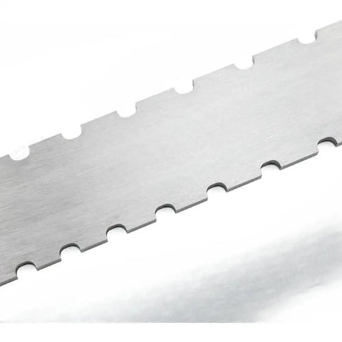 Close-up of notched guitar neck straight edge ruler for fretboard relief and neck curvature check aluminum precision gauge.
