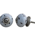 Snag These Dope White Ceramic Drawer Knobs For Kitchen Cabinets Smooth Etched Round Finish Upgrades Any Space No Sweat Install Heavy Duty Rust Free Build Kid Safe Edges And Top Notch Reliability For Years To Come. White ceramic drawer knobs with silver accents 1.5 inch diameter.