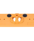 Yellow plastic 35mm hinge hole jig base for woodworking with central hole guide and side knobs