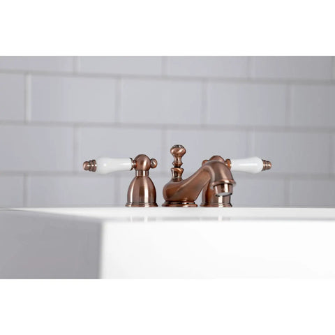 Restoration Mini Widespread Lavatory Faucet with Porcelain Lever Polished Chrome Solid Brass Construction installed on sink