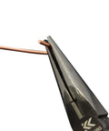 Radio Pliers With Cross Knurling Shaft Black Gold Finish cutting copper wire, showing sharp precision tip and secure grip.