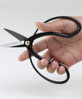 7 Inch Japanese Bonsai Scissors For Precision Pruning Of Mini Trees Hasami Pruning Shears Made In Japan Real Hand Forged S58C Black Carbon Steel Blade Garden Tools For Delicate Bonsai Work With Comfortable Grip By Niigata Artisans Pro Grade Quality, held in hand