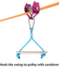 Zipline Pulley For Slackline Kit With Ninja Slider And Brake Stopper in use, attached to rope with a carabiner and wooden swing.