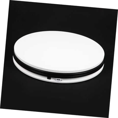 Sparkling 360 Rotating Turntable Display Stand For Jewelry Watches And Digital Products Mirror Base Electric Spin Platform view from top with smooth ABS construction.