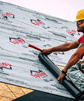 Man installing Ultra Freakin Lightweight Superior Synthetic Roofing Underlayment Heavy Duty Polymer Felt Alternative on roof.
