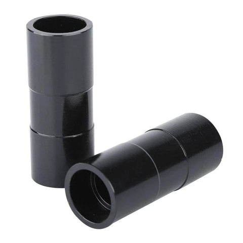 Two black metal inner cam bearing installer sleeves, hollow tubes with stepped sections.