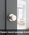 Juno Interior Non-Locking Passage Doorknob For Closets And Hallways, Satin Nickel Finish, installed on a grey door