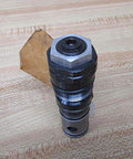 Single pilot-operated pressure relief valve DB20K2-12/100XYV 100 bar hydraulic safety regulator, side view on wooden surface