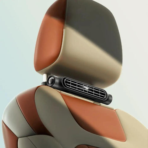 Portable Car Headrest Cooling Fan With 3 Speed USB Power Rear Seat Air Blower attached to a car seat, black color.