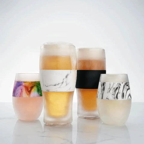 Freezable Insulated Pint Mugs Set Of 2 Double Walled Frosty Drink Glasses With Gel Core Keeps Beer And Cold Brew Icy Longer 16 Oz marble and colored beverage tumblers displayed together.