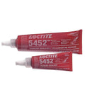 Two red tubes of Loctite 5452 showing labels for Heavy Duty Pipe Sealant For Hydraulic And Pneumatic Lines Brake Transmission PTO And Air Conditioning Fittings Single Component High Viscosity Sealant That Will Not Clog And Stays Flexible For High Pressure Fluid Power Systems No Nonsense.