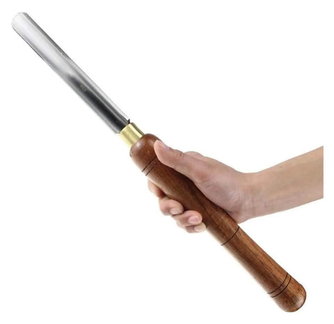 Dead Simple Wood Chisel Set Built Insanely Tough With High Carbon Steel Blades For Quick Wood Carving And Lathe Turning An Absolute Must Have Carpenter Gear Pack Kept Safe Inside A Classic Wooden Toolbox - close-up of chisel held in hand.