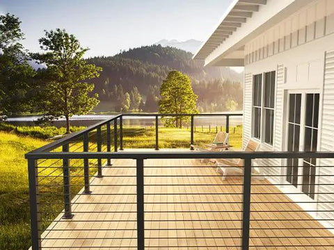 Heavy Duty Black Cable Railing Corner Post For Decks That Handles Any Outdoor Upgrade With Zero Sweat Surface Mount Install And Precision T Shaped Holes For 36 Inch Systems on a scenic deck.