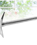 Lightweight Stainless Steel Dual Use Garden Hoe And Pickaxe With Comfortable Grip displayed against a window backdrop
