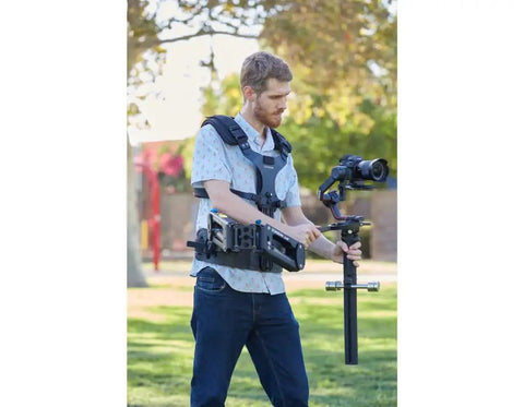 Person using Steadimate RS Gimbal Base And Balance Stud for DJI Ronin RS 2 RS 3 RS 3 Pro And RS4 Pro outdoors for steadier video