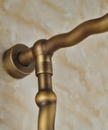 Close-up of antique bronze shower pipe with joint, part of UMJIGF 8 Inch Antique Shower System with Hot and Cold Water Shower Combo Set.