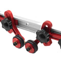 Heavy Duty Bearing Roller Featherboard Featuring An Angled Pulley Track with red aluminum rollers and securing knobs for woodworking.