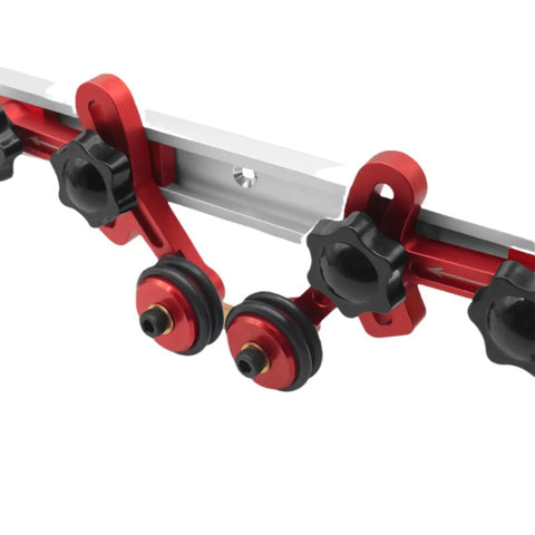Heavy Duty Bearing Roller Featherboard Featuring An Angled Pulley Track with red aluminum rollers and securing knobs for woodworking.