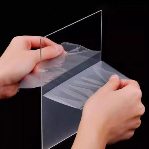 Hands applying Aluminum L Shaped Wall Corner Guard Peel And Stick Edge Protector For Drywall Wood Tile Metal Surfaces Black 2 cm