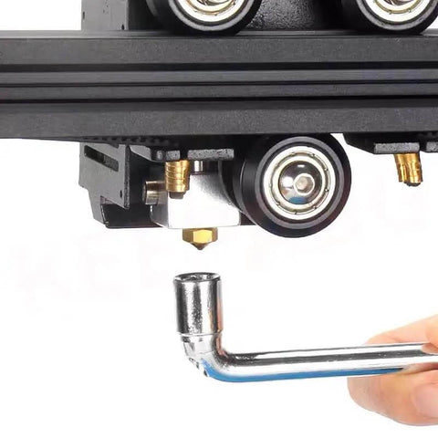 Adjusting 3D printer with Allen wrench from Ender Series 3D Printer Tool Kit For Easy Maintenance Featuring Clog Poke, Shear Pliers