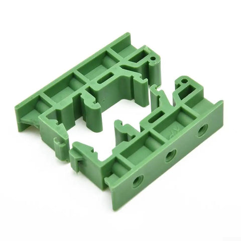 Knockout Slick 35mm Din Rail Mount Adapter Kit For Circuit Boards Loaded With Five Green C45 Plastic Brackets And Hardware, close-up of green plastic bracket.