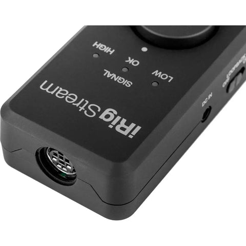 Close-up of iRig Stream Stereo Audio Interface For iPhone iPad Mac And PC With USB C Lightning and USB Ports, showing connector.