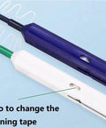 Two fiber optic cleaner pens (blue and white) for cleaning connector tips, front view.