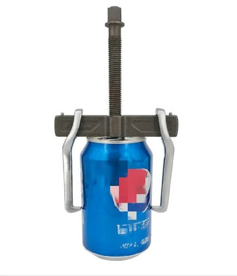 2 Jaw Gear Puller For Pulley Flywheel And Bearing Removal Pro Grade Gear Puller For Auto Shop Use Easy Bearing Extraction, installed on a can.