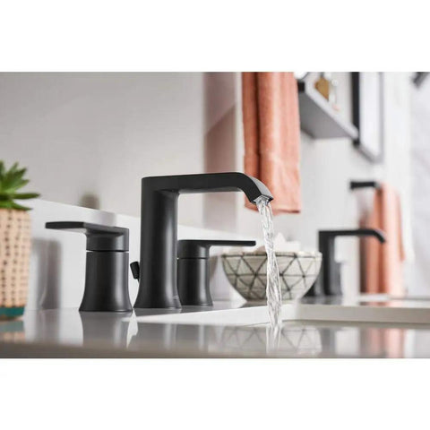 Genta 8-Inch Widespread Two-Handle Bathroom Faucet In Matte Black With Durable Finish, Smooth Ceramic Valves shown installed on sink